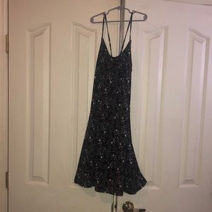 Black strappy dress with open back that ties